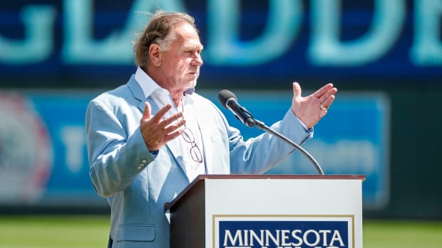 Aug 21, 2022; Minneapolis, Minnesota, USA; Minnesota Twins former player Dan Gladden addresses the crowd as inducted into the Twins hall of fame before the game with the Texas Rangers at Target Field.